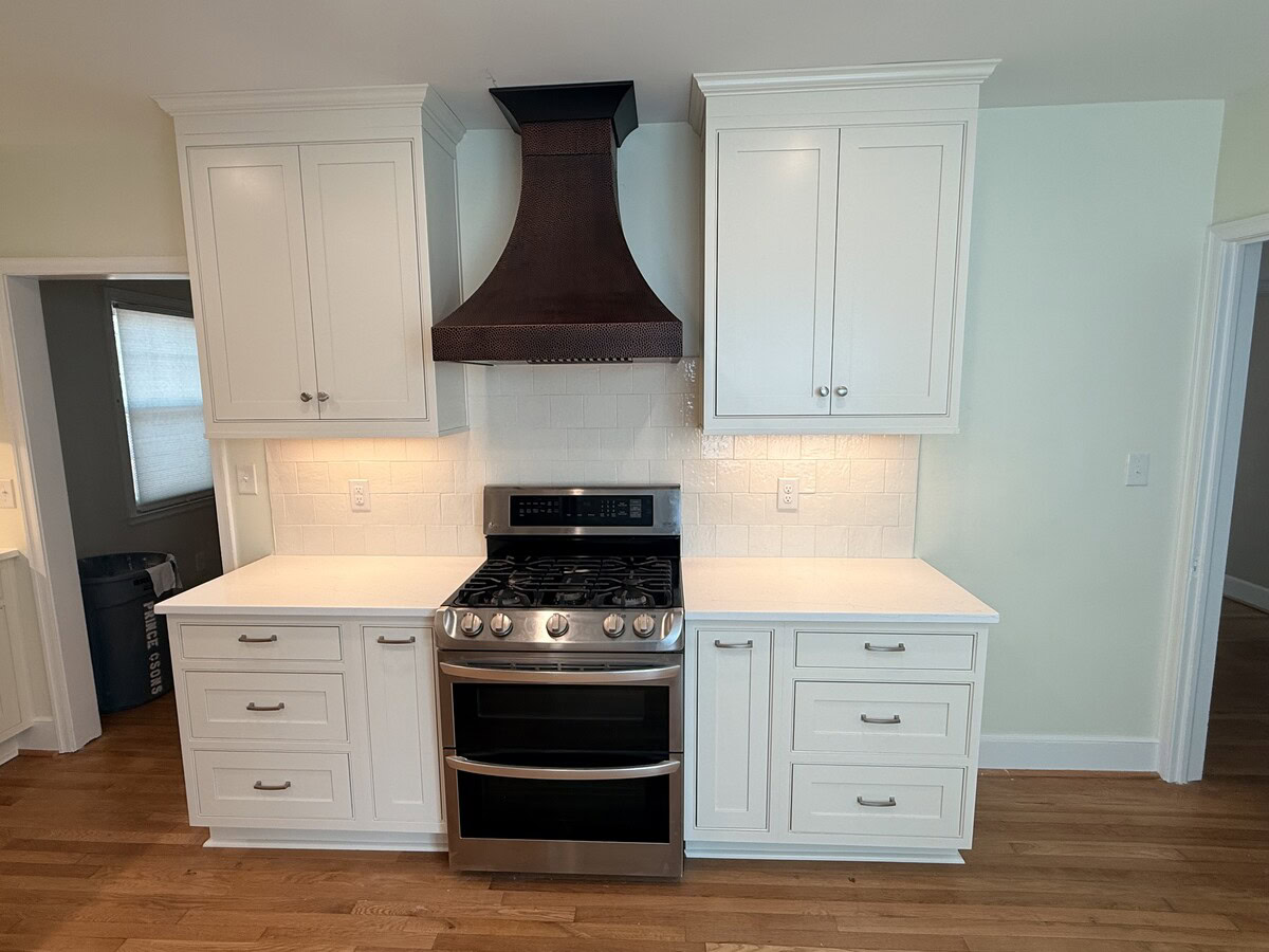 Kitchen Renovation With Copper Hood and Inset Cabinets